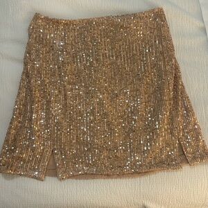 Medium, sequin, gold mini skirt from vestique new with tags!